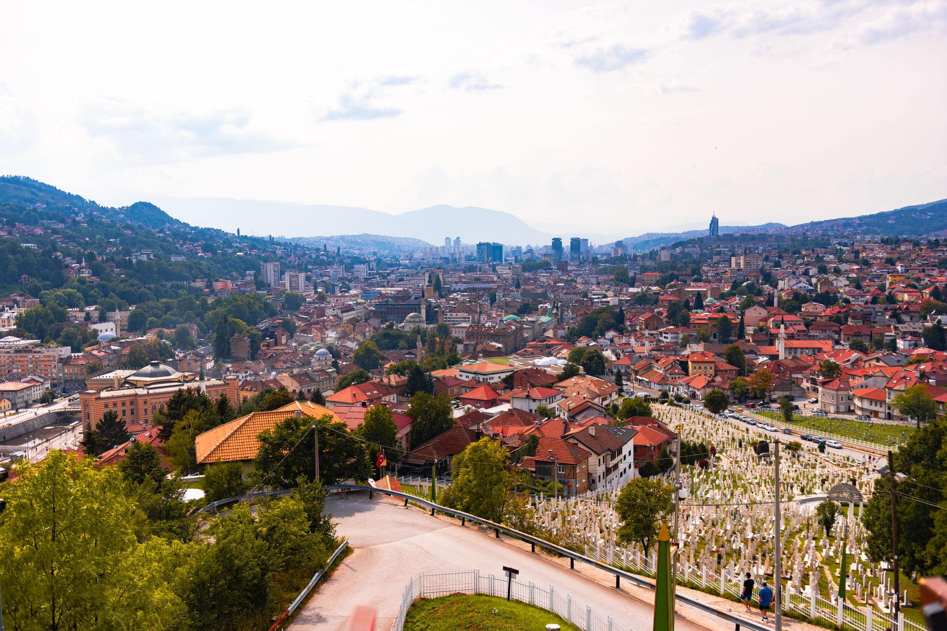The Miljacka riverbank and Inat Kuća